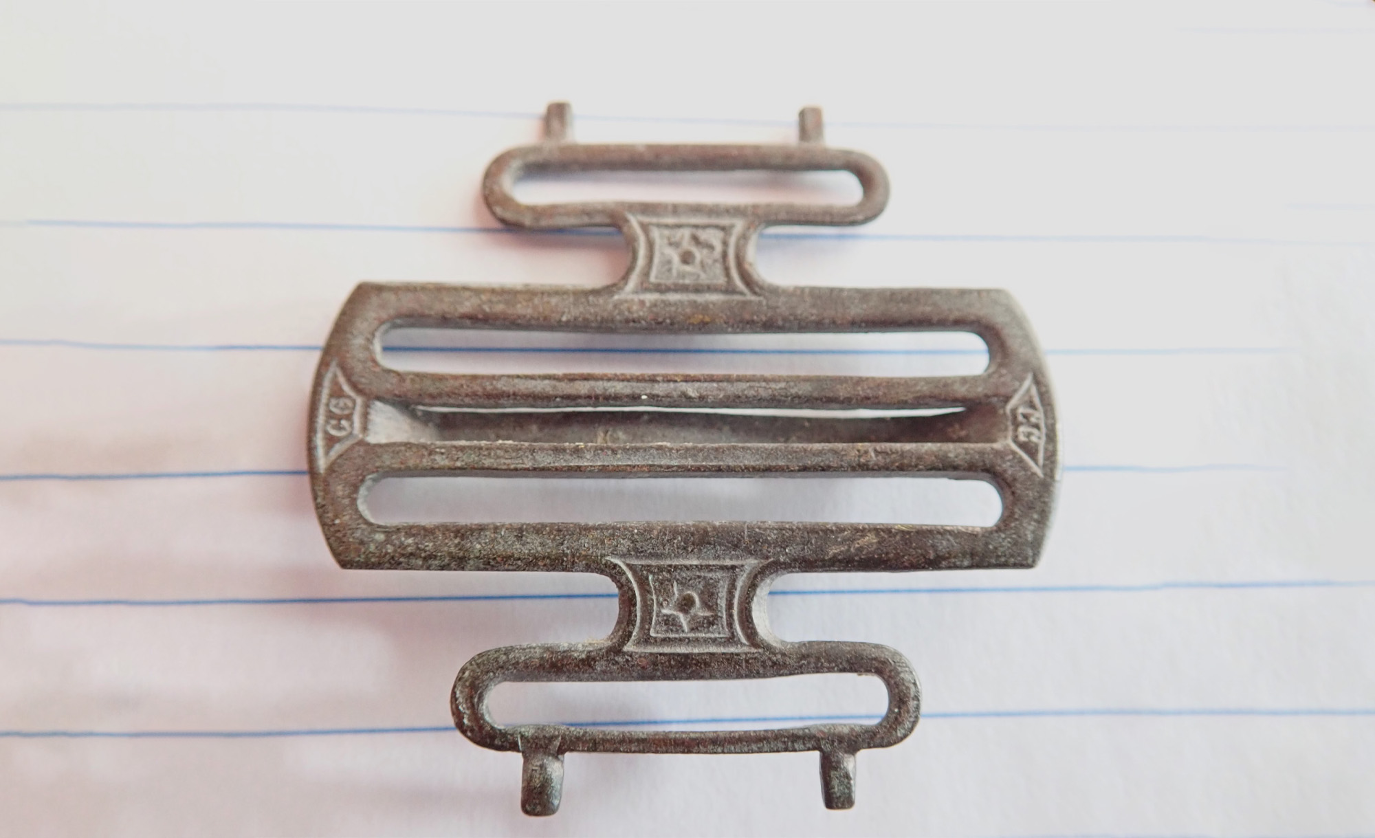 92. Buckle, suspender, man, 1.375 L x W, Civil War era (a)